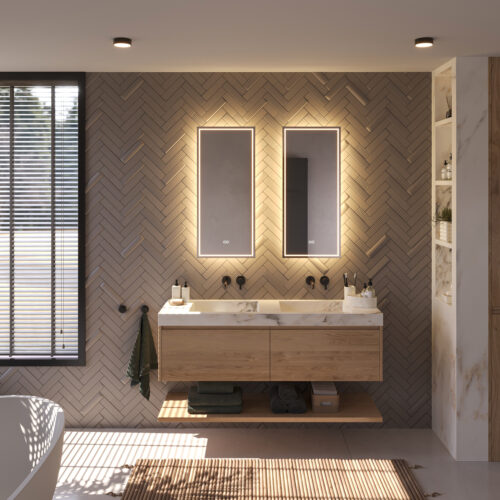 Beschik je over een breed badkamermeubel met 2 kranen of over 2 losse badkamermeubels? Denk dan eens aan 2 spiegels naast elkaar