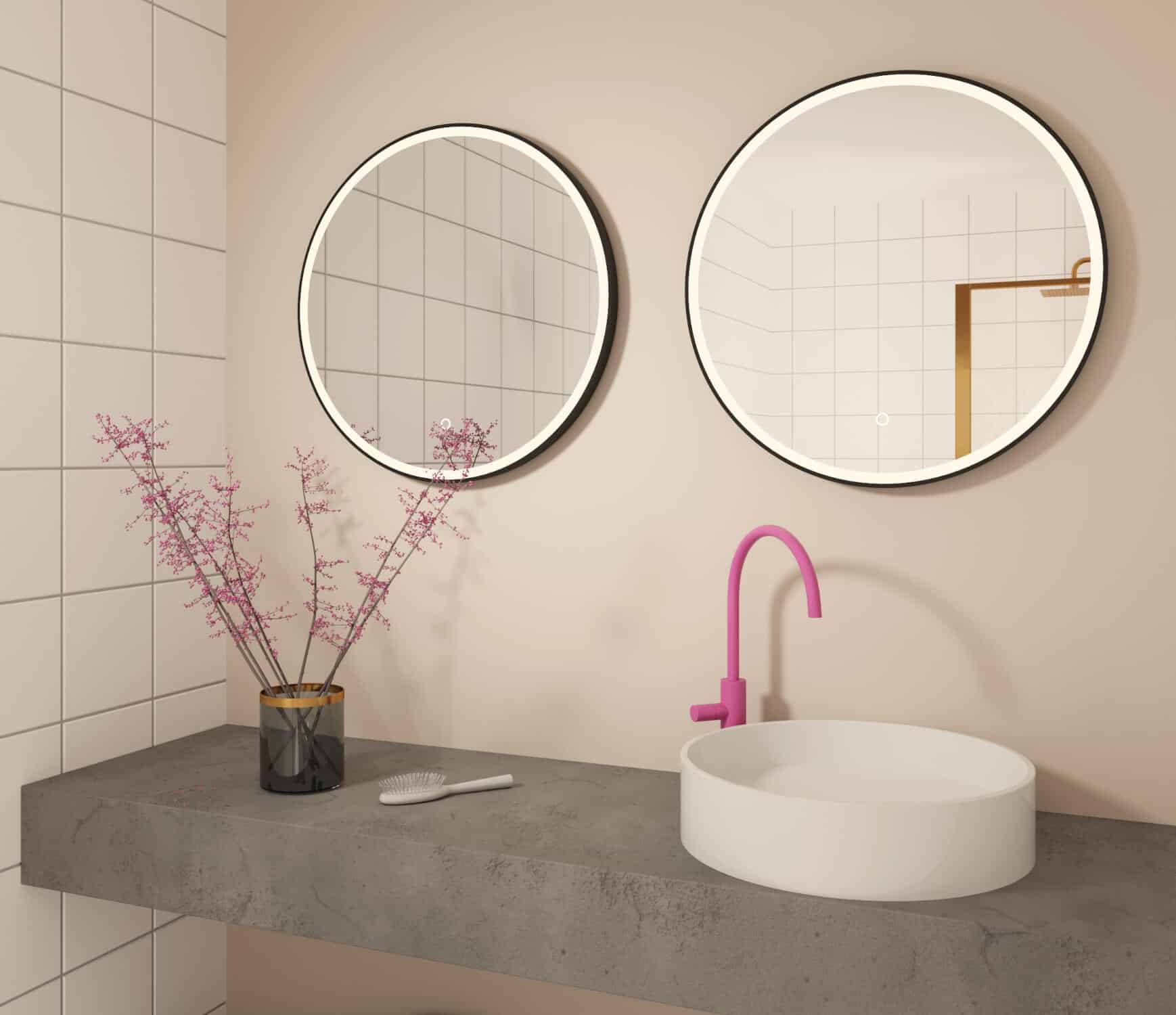 Bij een breed badmeubel is het stijlvol om 2 ronde spiegels naast elkaar te plaatsen!