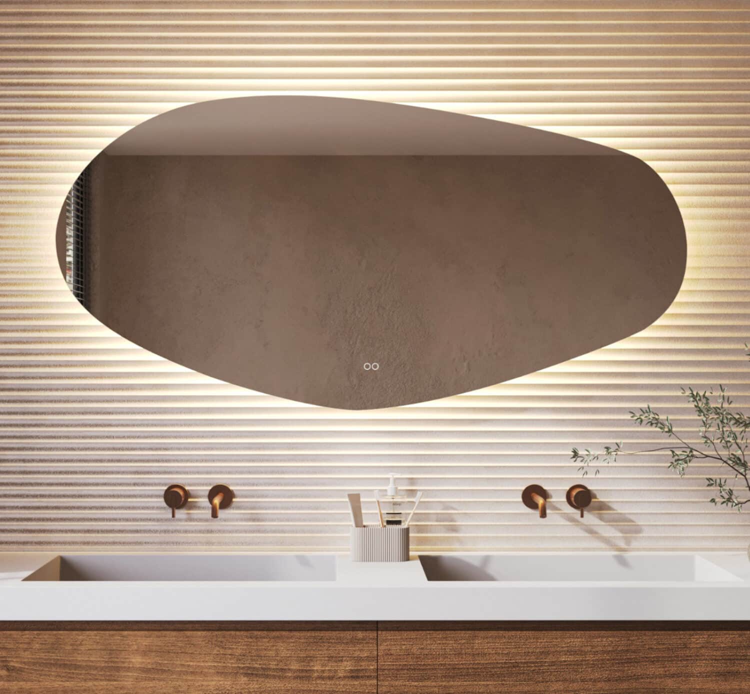 Deze stijlvolle badkamer spiegel met organische vorm is van alle gemakken voorzien, zoals: ambi verlichting, spiegelverwarming, dimfunctie en een instelbare lichtkleur